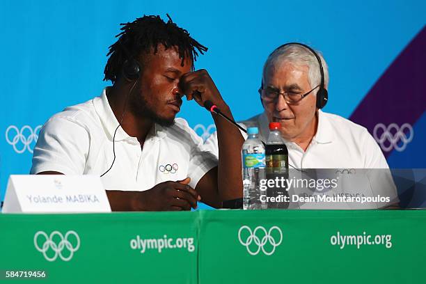 Popole Misenga, a Democratic Republic of Congo Judo fighter, who now represents the team of Refugee Olympic Athletes shows emotion when speaking...