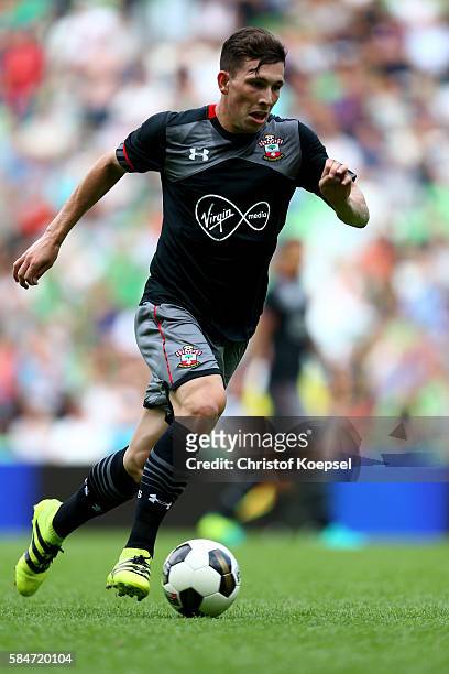 Pierre-Emile Hoejbjerg of Southampton runs with the ball during the friendly match between FC Groningen an FC Southampton at Euroborg Stadium on July...