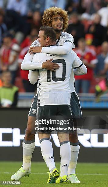 Marouane Fellaini of Manchester United celebrates scoring their fourth goal during the pre-season friendly match between Manchester United and...