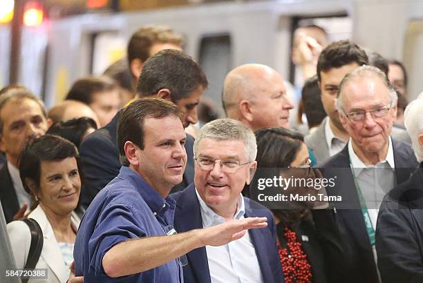 International Olympic Committee President Thomas Bach chats with Rio de Janeiro Mayor Eduardo Paes at an event inaugurating the new Metro Line 4...