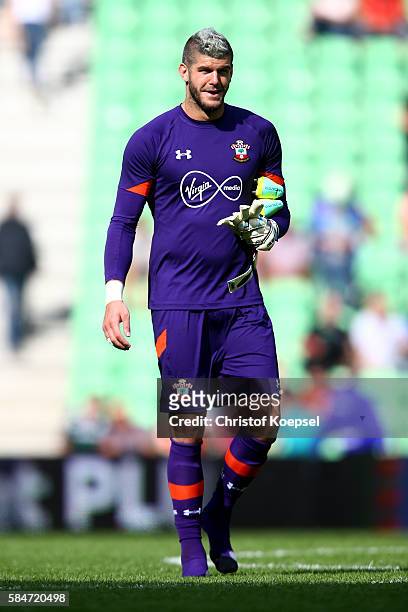 Fraser Forster of Southampton looks on during the friendly match between FC Groningen an FC Southampton at Euroborg Stadium on July 30, 2016 in...