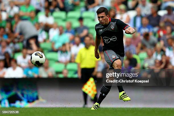 Pierre-Emile Hoejbjerg of Southampton runs with the ball during the friendly match between FC Groningen an FC Southampton at Euroborg Stadium on July...