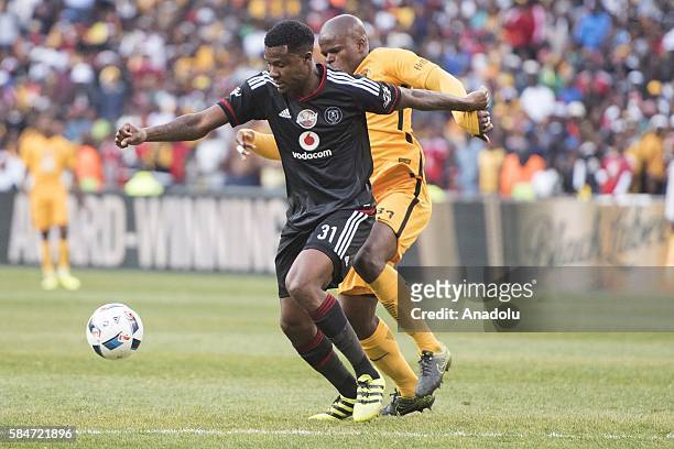 Gabuza Thamsanqa of Orlando Pirates in action against Willard Katsande Kaizer Chiefs F.C during 2016 Carling Black Label Cup between Kaizer Chiefs...