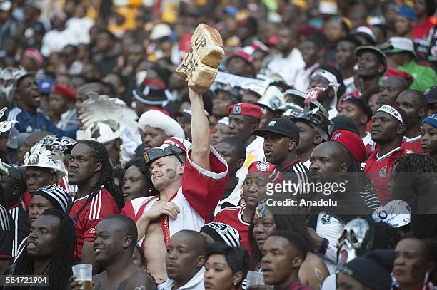 Fans of Orlando Pirates support their team during Ekstein Hendrick Kaizer Chiefs F.C during 2016 Carling Black Label Cup between Kaizer Chiefs F.C....