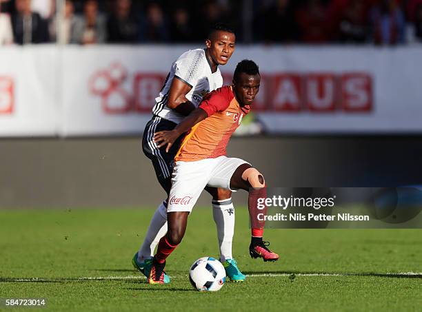 Bruma of Galatasaray and Antonio Valencia of Manchester United competes for the ball during the pre-season Friendly between Manchester United and...