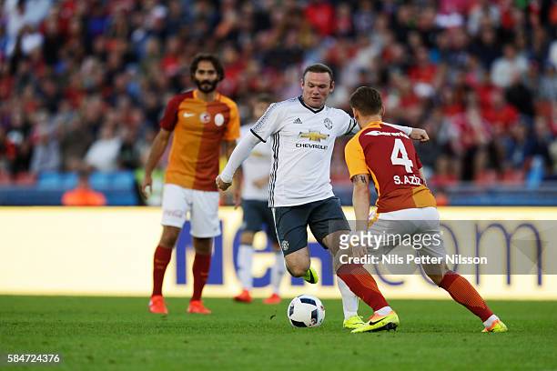 Wayne Rooney of Manchester United and Hamit Altntop of Galatasaray during the pre-season Friendly between Manchester United and Galatasaray at Ullevi...
