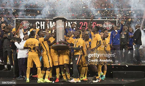 Footballers of Kaiser Chiefs celebrate their victory at the end of the 2016 Carling Black Label Cup between Kaizer Chiefs F.C. And Orlando Pirates at...