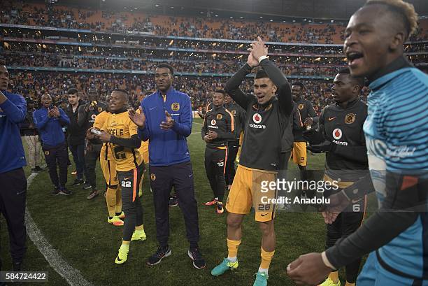 Footballers of Kaiser Chiefs celebrate their victory at the end of the 2016 Carling Black Label Cup between Kaizer Chiefs F.C. And Orlando Pirates at...
