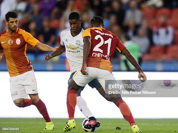 Marcus Rashford of Manchester United and Aurélien Chedjou of Galatasaray during the pre-season Friendly between Manchester United and Galatasaray at...