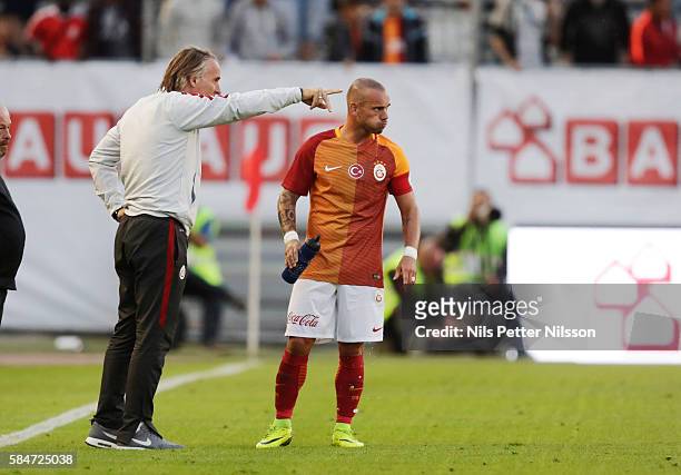 Jan Olde Riekerink, head coach of Galatasaray and Wesley Sneijder of Galatasaray during the pre-season Friendly between Manchester United and...