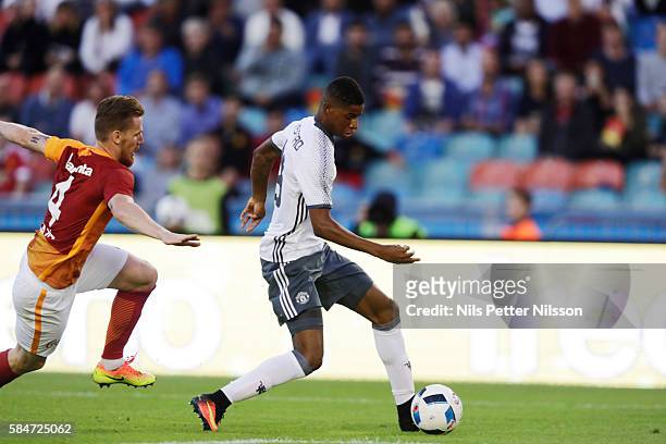 Marcus Rashford of Manchester United and Hamit Altntop of Galatasaray during the pre-season Friendly between Manchester United and Galatasaray at...