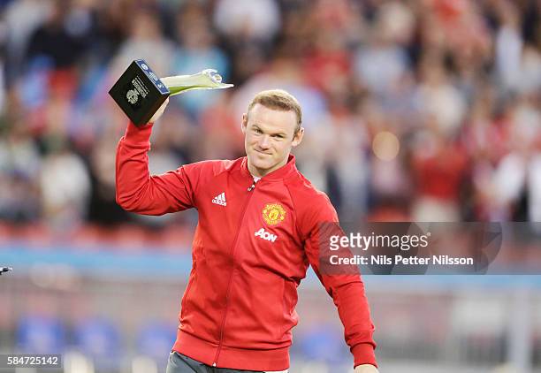 Wayne Rooney of Manchester United receiving at trophy after the pre-season Friendly between Manchester United and Galatasaray at Ullevi on July 30,...