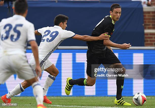Enzo Zidane of Real Madrid closes down Nemanja Matic of Chelsea during the 2016 International Champions Cup match between Real Madrid and Chelsea at...