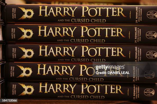 Piles of the new Harry Potter script book "Harry Potter and the Cursed Child Parts One & Two" are pictured inside Waterstones bookshop on Piccadilly...