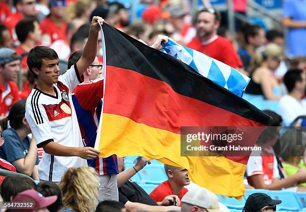 Bayern Munich fans cheers during an International Champions Cup match against FC Internazionale at Bank of America Stadium on July 30, 2016 in...