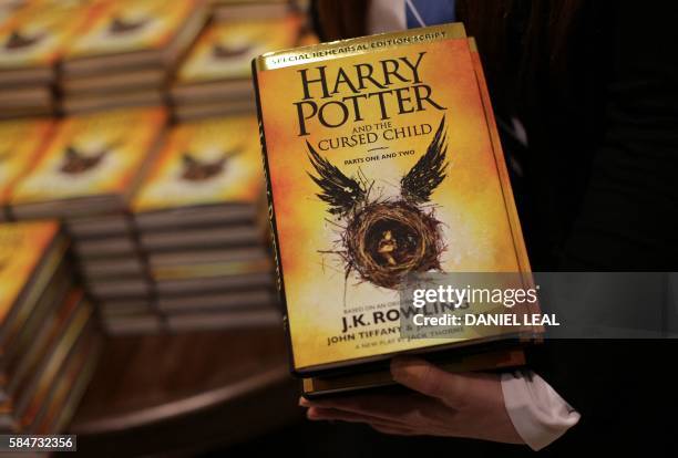 Piles of the new Harry Potter script book "Harry Potter and the Cursed Child Parts One & Two" are pictured inside Waterstones bookshop on Piccadilly...