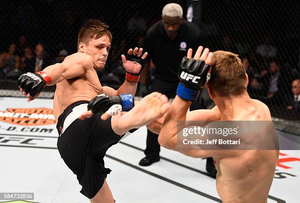 Michael Graves kicks Bojan Velickovic in their welterweight bout during the UFC 201 event on July 30, 2016 at Philips Arena in Atlanta, Georgia.