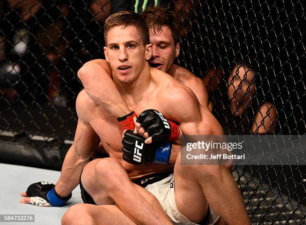 Michael Graves controls the body of Bojan Velickovic in their welterweight bout during the UFC 201 event on July 30, 2016 at Philips Arena in...