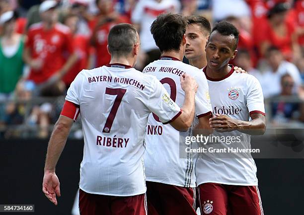 Julian Green of FC Bayern Munich celebrates with teammates after scoring a goal against FC Internazionale during an International Champions Cup match...