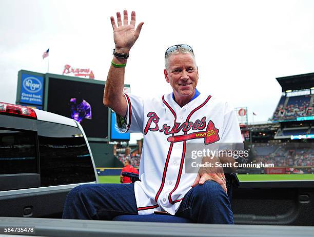 Former Atlanta Braves pitcher Tom Glavine is honored along with the 1991 NLCS Champions before the game against the Philadelphia Phillies at Turner...