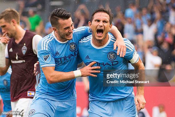 Midfielders Jack Harrison and Frank Lampard of New York City FC celerate after scoring a goal during the match vs Colorado Rapids at Yankee Stadium...
