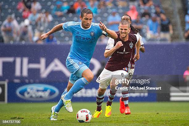 Midfielder Frank Lampard of New York City FC controls the ball past Sam Cronin of Colorado Rapids during the match at Yankee Stadium on July 30, 2016...