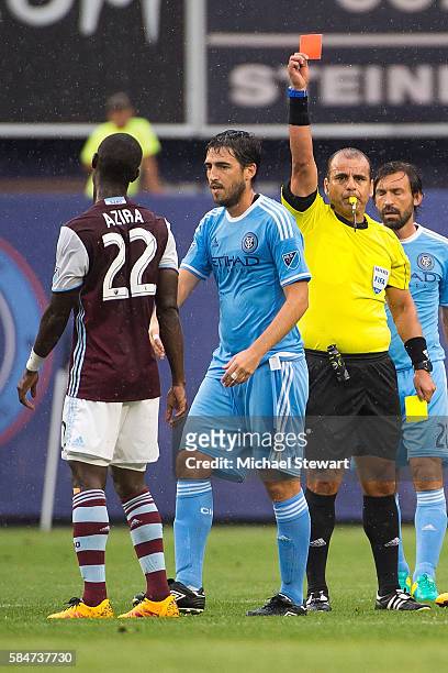 Midfielder Michael Azira of Colorado Rapids receives a red card during the match vs New York City FC at Yankee Stadium on July 30, 2016 in New York...