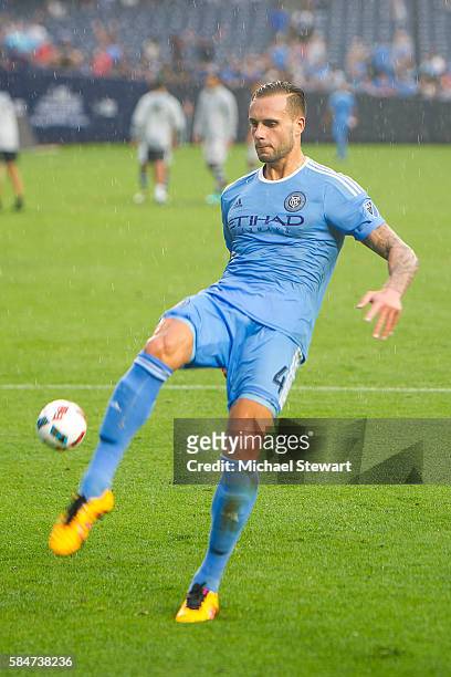 Defender Maxime Chanot of New York City FC kicks a ball to fans after the match vs Colorado Rapids at Yankee Stadium on July 30, 2016 in New York...