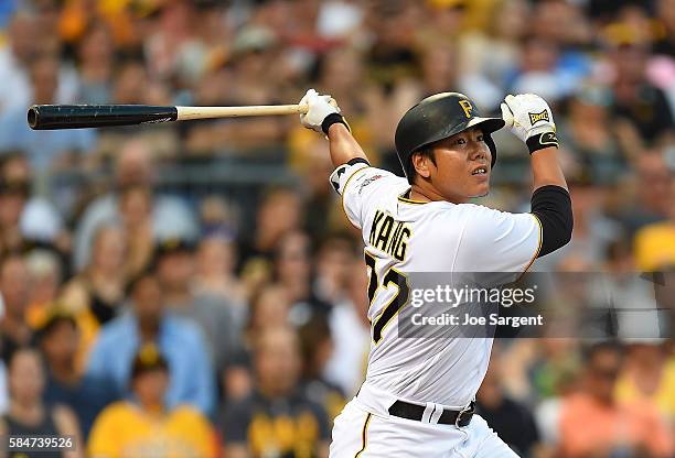 Jung Ho Kang of the Pittsburgh Pirates bats during inter-league play against the Seattle Mariners on July 27, 2016 at PNC Park in Pittsburgh,...