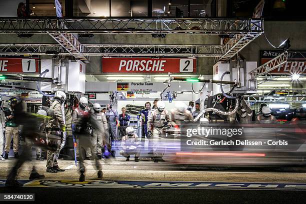 Porsche Team , #2 Porsche 919 Hybrid with Drivers Romain Dumas , Mark Lieb and Neel Jani in the pit lane during the 84th running of the Le Mans 24...