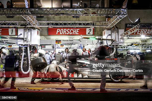 Porsche Team , #2 Porsche 919 Hybrid with Drivers Romain Dumas , Mark Lieb and Neel Jani in the pit lane during the 84th running of the Le Mans 24...