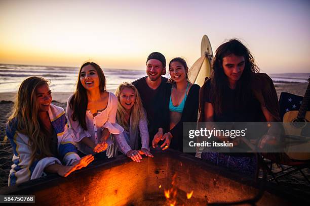 friends having fun at san diego beach - bonfire beach stock pictures, royalty-free photos & images