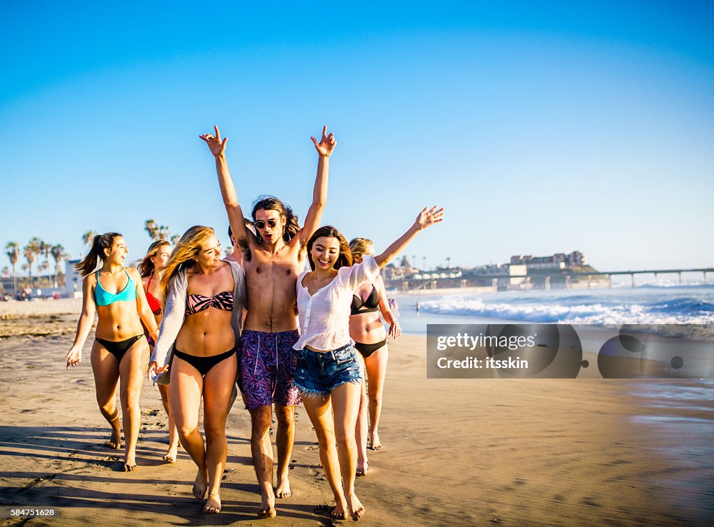 Friends having fun at San Diego beach