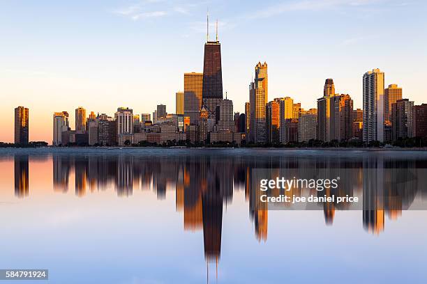 reflected, chicago, skyline, lake michigan, illinois, america - skyline fotografías e imágenes de stock