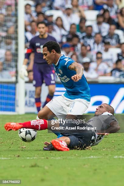 Aldo Ramirez of Cruz Azul fights for the ball with Walter Gargano of Monterrey during the 3rd round match between Monterrey and Cruz Azul as part of...