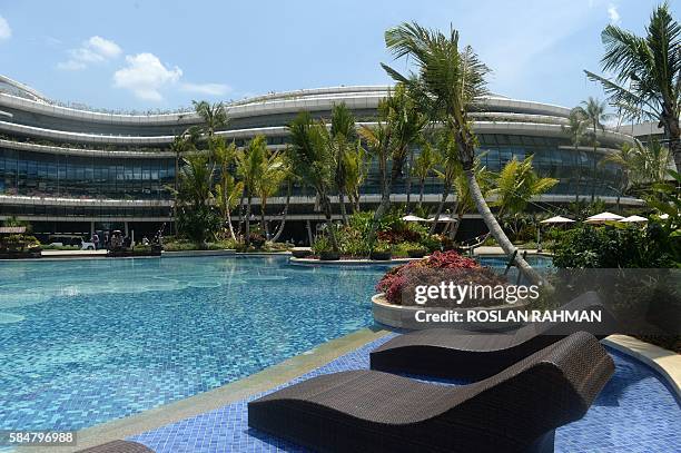 This picture taken on April 19, 2016 shows a general view of the pool next to main building at Forest-City, one of the man-made islands on the...