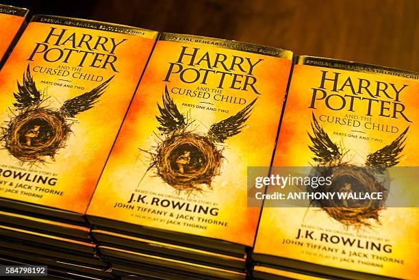 Copies of the book 'Harry Potter and the Cursed Child' are displayed on the day of its release at a bookstore in Hong Kong on July 31, 2016. 'Harry...
