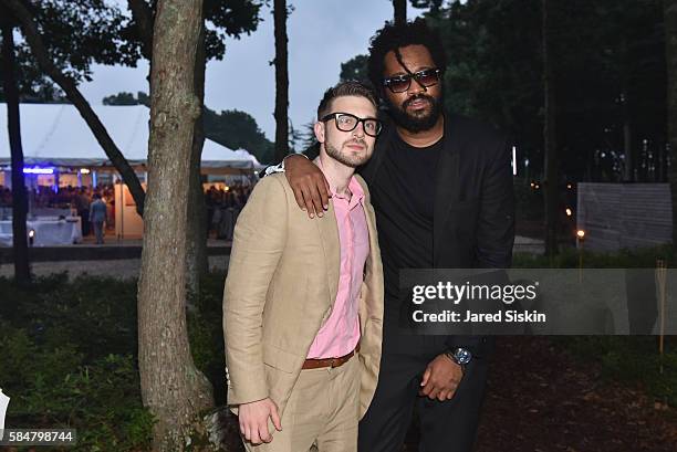 Philanthropist Alexander Soros and designer Maxwell Osborne attends the 23rd Annual Watermill Center Summer Benefit & Auction at The Watermill Center...