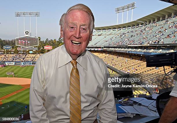 Los Angeles Dodgers broadcaster Vin Scully in the booth before the game between the Los Angeles Dodgers and the Arizona Diamondbacks at Dodger...