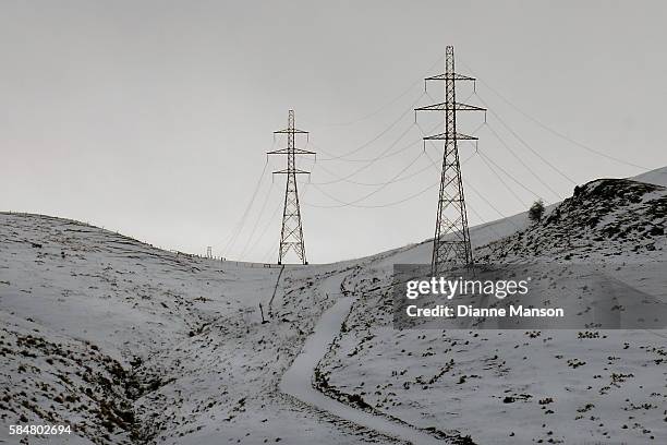 Snow blankets farmland between Mataura and Clinton on the Old Coach Road on July 31, 2016 in Invercargill, New Zealand. Showers and cold temperatures...