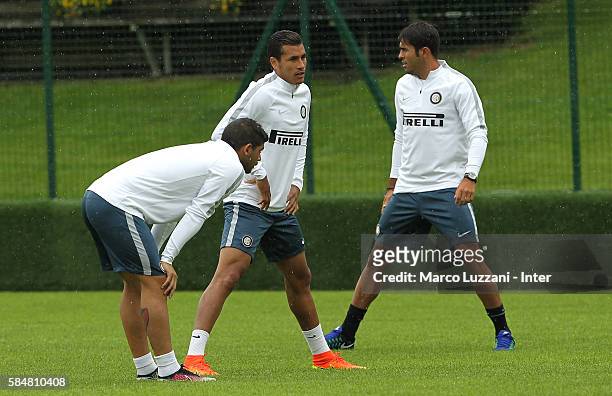 Ever Banega, Jeison Murillo and Eder Citadin Martins of FC Internazionale run during of the FC Internazionale Juvenile Team training Session on July...