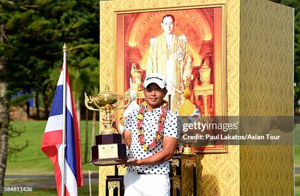 Chan Shih-chang of Chinese Taiepi pictured with the winner's trophy during round four of the King's Cup at Phoenix Gold Golf and Country Club on July...