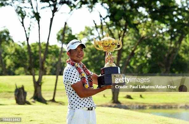 Chan Shih-chang of Chinese Taiepi pictured with the winner's trophy during round four of the King's Cup at Phoenix Gold Golf and Country Club on July...