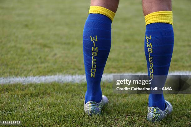 Wimbledon socks during the Pre-Season Friendly match between AFC Wimbledon and Crystal Palace at The Cherry Red Records Stadium on July 27, 2016 in...