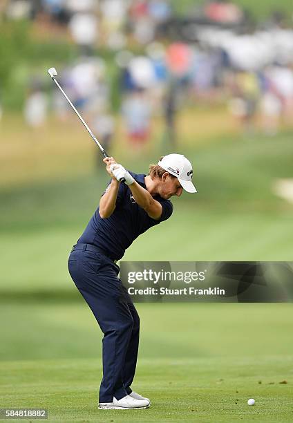 Emiliano Grillo of Argentina plays a shot on the third hole during the continuation of the weather delayed third round of the 2016 PGA Championship...
