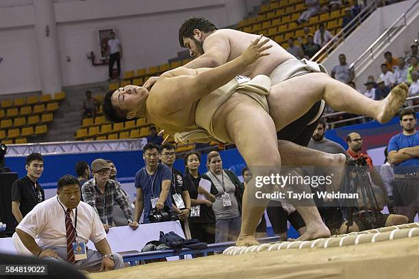 Junior competitors wrestle during the 2016 World Sumo Championship on July 30, 2016 in Ulaanbaatar, Mongolia.