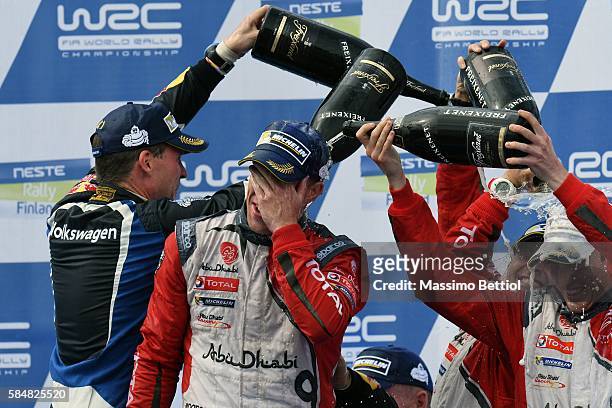 Kris Meeke of Great Britain and Paul Nagle of Ireland celebrate their victory during Day Three of the WRC Finland on July 31, 2016 in Jyvaskyla,...