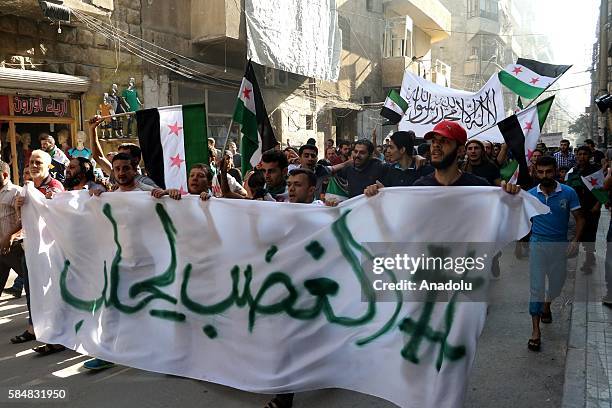 Civilians stage a protest against Assad Regime in Al Mashhad neighborhood, where sieged by Assad Regime forces in Aleppo, Syria on July 31, 2016.