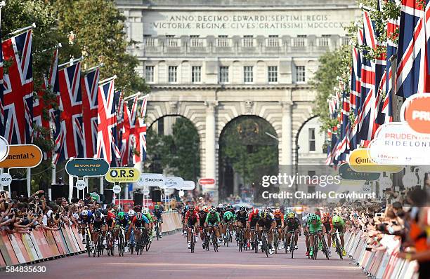 The Peloton begin the sprint for the finish as it makes its way down the mall during the Prudential RideLondon Surrey Classic on July 31, 2016 in...