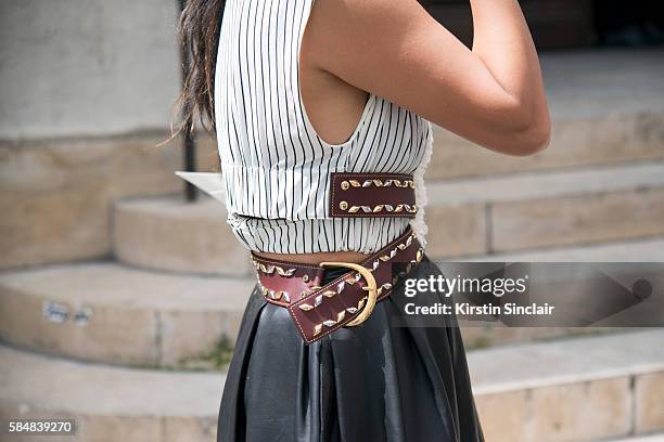 Fashion stylist Tina Leung wears a Rochas skirt, Louis Vuitton top day 2 of Paris Haute Couture Fashion Week Autumn/Winter 2016, on July 4, 2016 in...